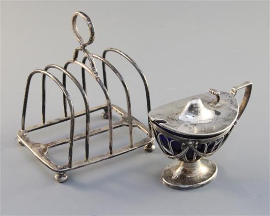 An Edwardian silver mustard and a late Victorian four division toastrack, 9.7 oz.